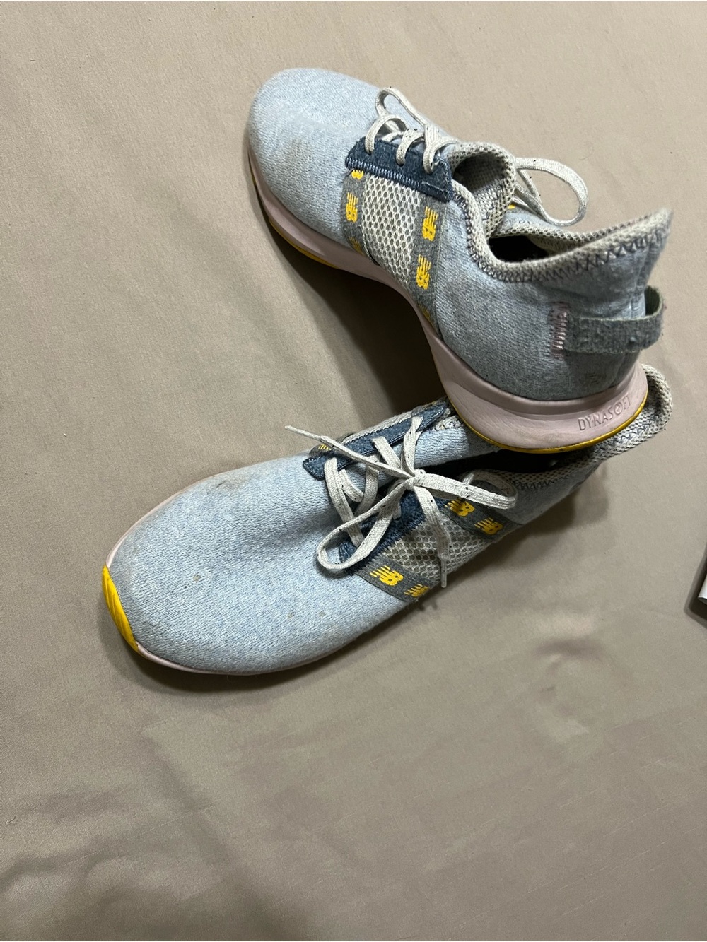 New Balance women’s blue Sneakers with Yellow Accents